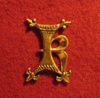 M09 Бэдж в виде буквы  "К"